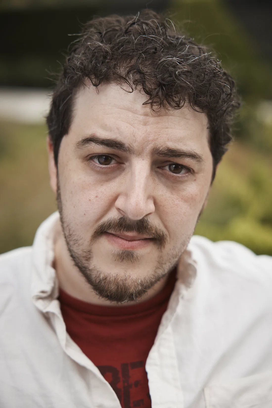 Ricky DeRosa headshot, serious